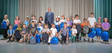 Школьные рюкзаки — детям из Нежинки